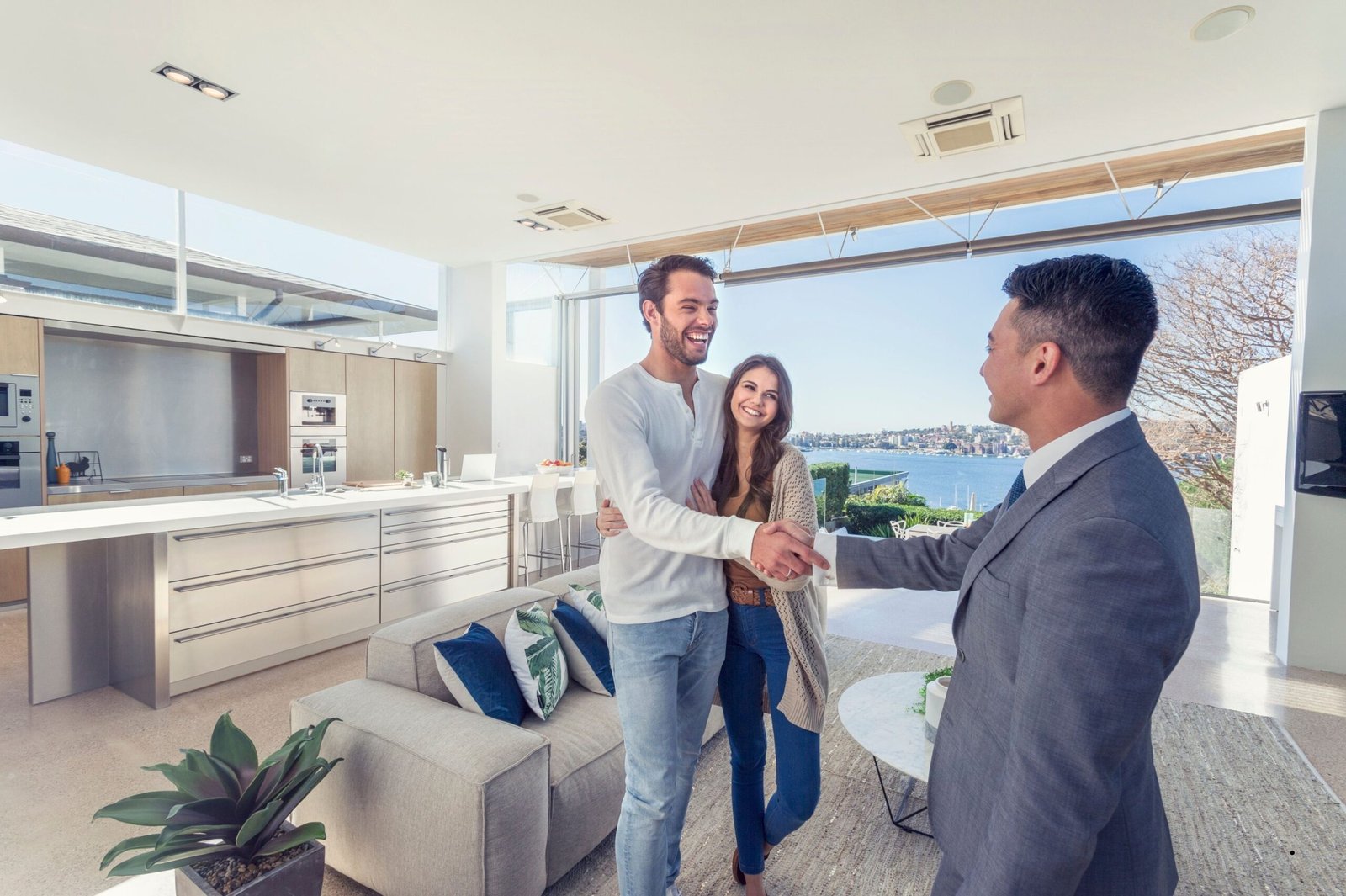 Happy couple buying property with a real estate agent in Alanya